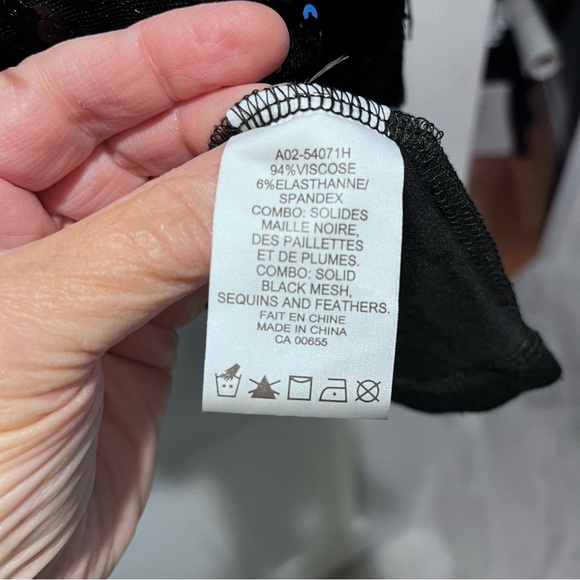 Black tank top with sequin and feather detail. Size 3X. Super cute and comfy. - Picture 4 of 5